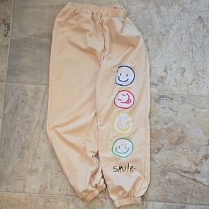 ROMWE Tan Joggers with Multicolor Smiley Faces